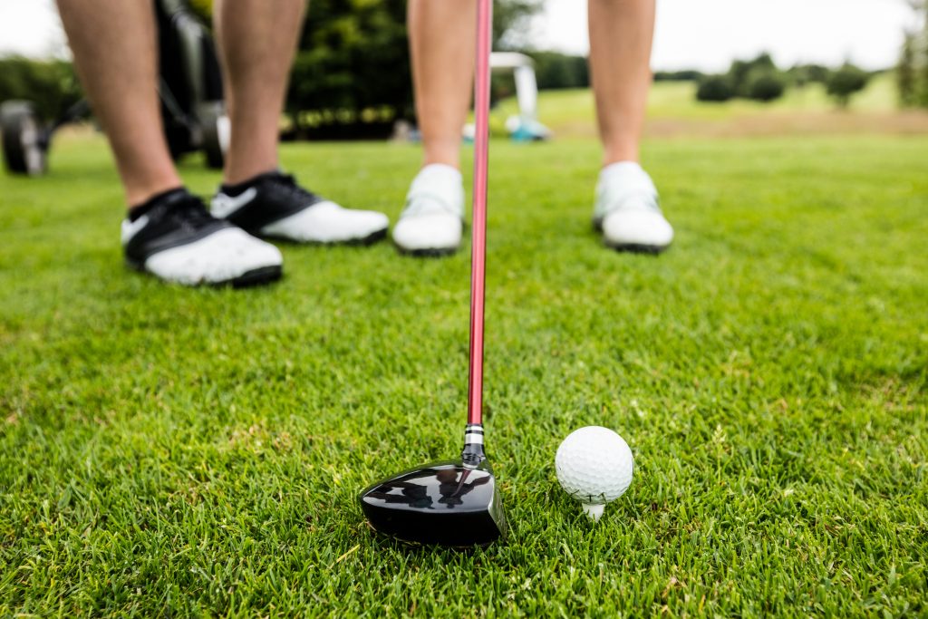 Golf Instructor with Golf Student